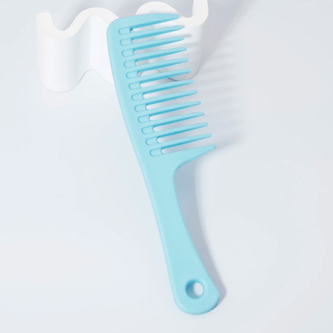 مشط تصفيف الشعر واسع الأسنان،  - مراجعة Detangling Wide Comb وسعره